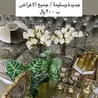 شمعدان مع شمع   فازات مع ورد   علب صابون قزاز مع قاعدة