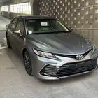 كامري 2024 LE جنوط بنزين لون تيتانيوم اصفار سعودي