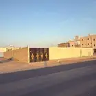حوش للبيع على شارع تجاري في مخطط حمراء الاسد