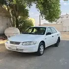 كامري 2002 ابيض نظيف