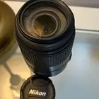 عدسة نيكون 55-300mm نظيفة العزل ممتاز
