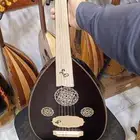 عود موسيقي كهربائي