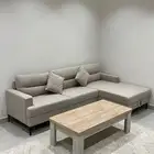 كنب وطاولة وفرشة