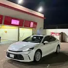 كامري 2025 نص فل ابيض لؤلؤي تشغيل عن بعد