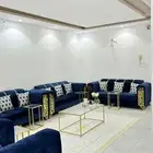 كنب مع طاولات وسجاد