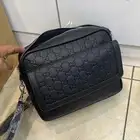 شنط يد قوتشي رجالي