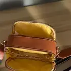 شنطة يد جديدة  (اصلية) مالبستها غير مره   مع كيسها ونظيفة