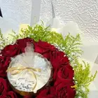 باقه ورد مع شمعه بالعبارات