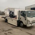 سطحه الخرج لنقل السيارات