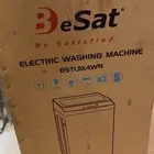 غساله حجمها 11كيلو جديده ماستخدمت