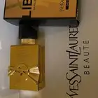 عطر إيف سان لوران إصدار ذهبي مستعمل استعمال خفيف جدا  رشتين