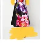 فستان مثل الصورة بالضبط ولكنه علا ق ويرسم الخصر