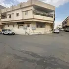 للبيع عمارة 8 شقق على شارعين غربي وجنوبي بموقع مميز 8 عدادات