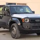 تويوتا برادو 2.4 تي اكس 1 2025 أبيض بنزين ستاندر سياحي