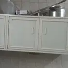 Two pieces of aluminum kitchen cabinets