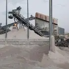 كسارة اسفلت مع طاقم العمل