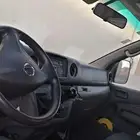 باص نيسان ديزل قير عادي سقف عالى نظيف ومفحوص