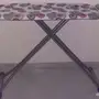 صندوق تخزين الجزم و طاولة كوي و مكنسة كهربائي