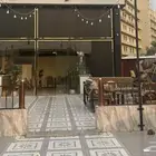بوفيه للتقبيل بجانب الحجاج والمعتمرين