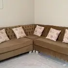 كنب زاويه حرف L لون زيتي   مع كرسي 2 مشجر