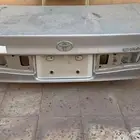 رفارف اصلي وشنطه وديكور باب خلفي كامري 2002 وكاله