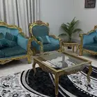 كنب مع طاولات وسجاده