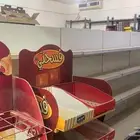 رفوف بقاله وثلاجات