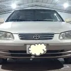 تويوتا كامري فتحة مديل 2001 ذهبي - الخرج