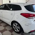 كيا كارنس واجن 2015 أبيض