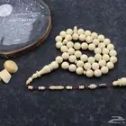 سبحة من ناب حوت العنبر ( من النوادر )