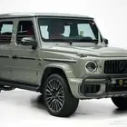 مرسيدس G 63 موديل 2025 أصفار خليجي رمادي كلاسيك أحمر