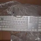 كيبورد ابل سلك فيه مداخل usb