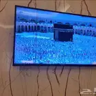 تلفزيون 65 بوصة