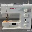 ماكينة خياطة وتفصيل