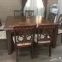 طاولة طعام ب 8 كراسي مستعملة للبيع 