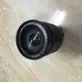 عدسة كانون 18-200 الشاملة