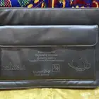 شنطة جلد بشعار ارامكو السعودية