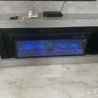 مدفئه ديكور مع اضاءات مختلفه وسبيكر بلوتوث جديده