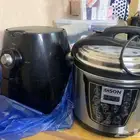 قدر ضغط كهربائي وقلاية وطاولة