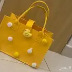 دمية وحقيبة لعبة