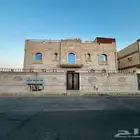 فيلا مع 4 شقق و5 محلات تجارية