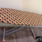 طاولة كي وزينة جدار