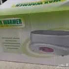 جهاز تسخين شمع برافين (Wax Warmer)