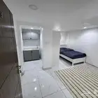غرف استوديو عزاب شامل الكهرباء والماء في حي السنابل 1