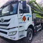 مضخة خرسانة زمليون صيني شبه جديدة وسيارة فاو 2023