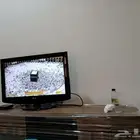 تلفزيون وطاولة تلفزيون