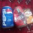 علب قديمه ببسي وكوكا كولا وربيع قديمه