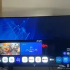 شاشة MTC 65 UHDبوصة و ثلاجة