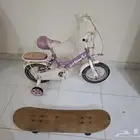عجلة اطفال و لوح تزحلق