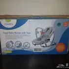 Baby rocker like new with all packaging from centre point